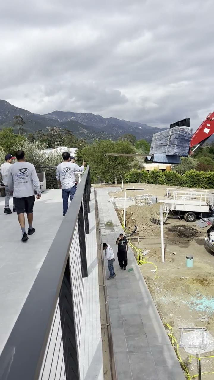 Black Horse Delivery using a forklift to deliver a priceless antique through a balcony